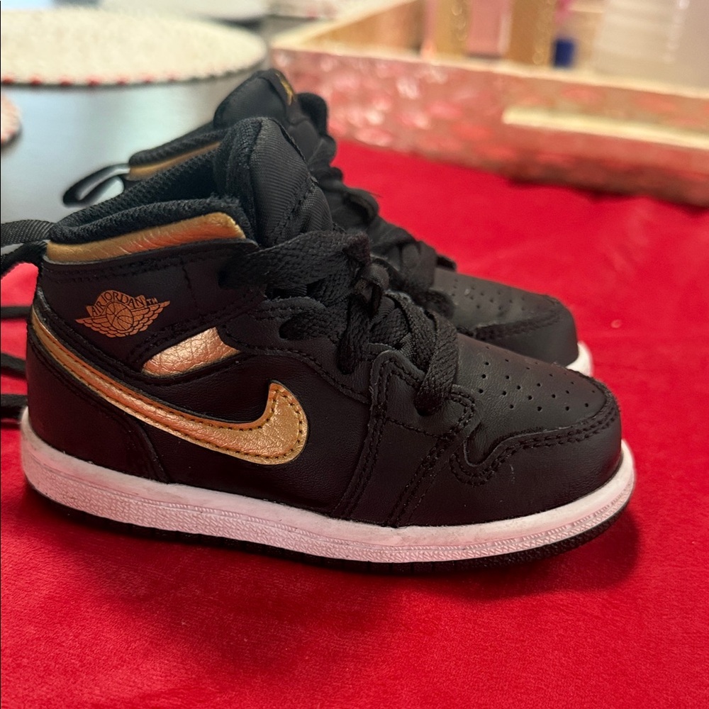 Air Jordan Nike Kids Black and Gold Sneakers